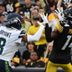 The Steelers’ George Pickens makes a catch for a 26-yard touchdown reception as Coby Bryant defends in the first quarter during a preseason game in Pittsburgh.